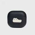 Interior microfiber lining protects AirPods from scratches Black textured air pod case with a white logo on a light gray background