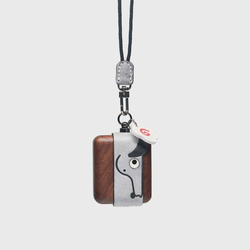 Cute Doggy AirPods Pro Case Wood Walnut Leather iwoodstore Wooden and metal pendant with a dog design on a white background