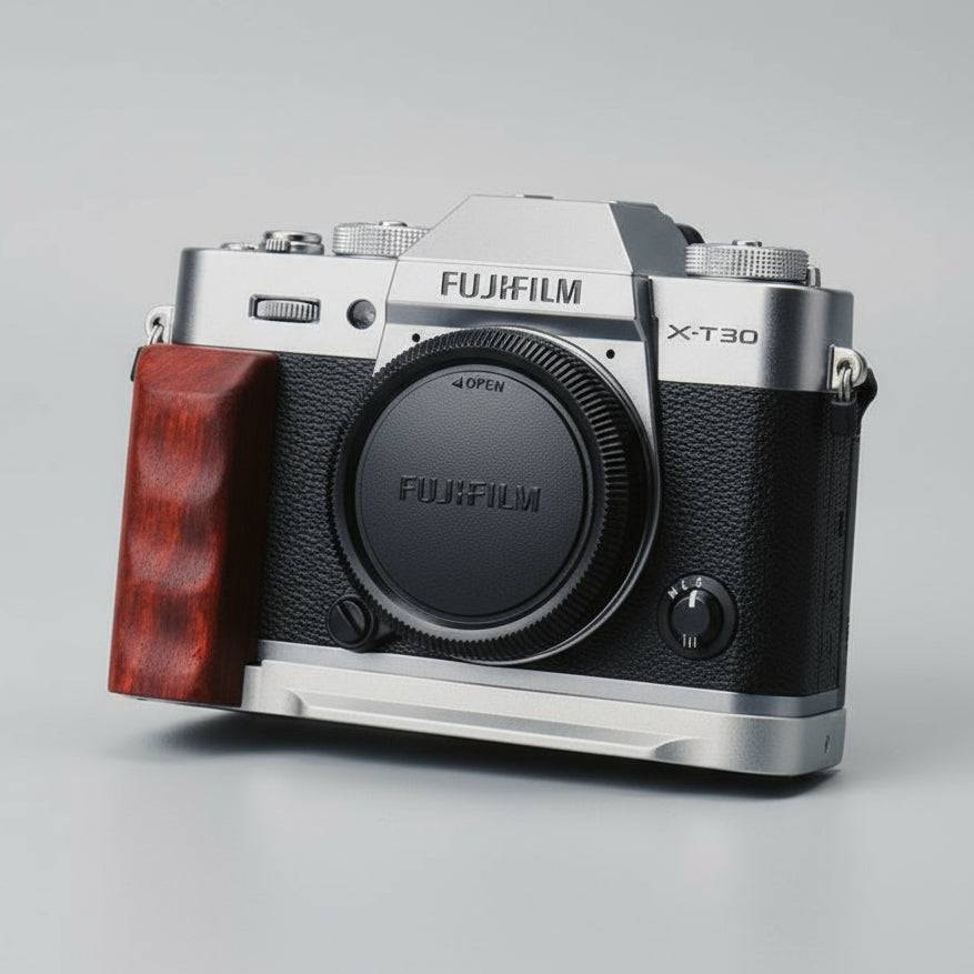 Fujifilm X-T30 camera with a wooden grip on a gray background