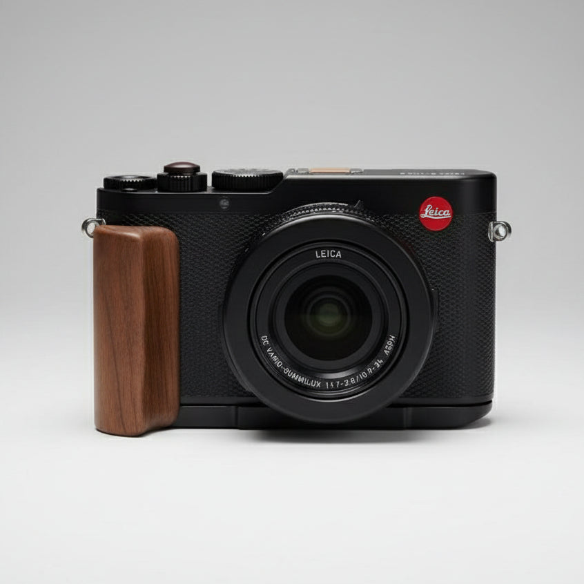 Leica camera with a wooden grip on a gray background