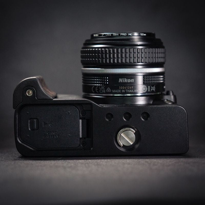 Nikon camera lens on a dark background