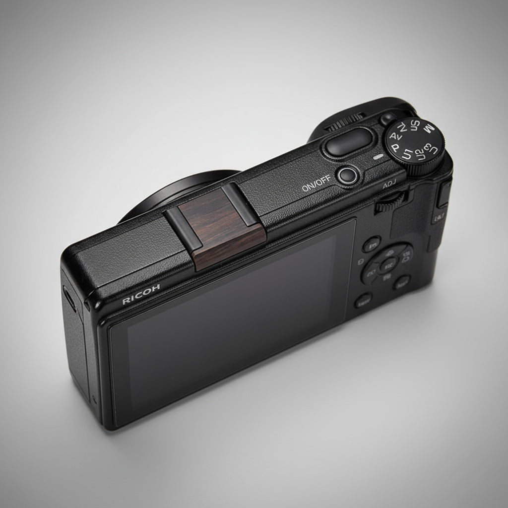Ricoh GR4 Hotshoe Cover Wood iWoodStore Black Ricoh camera on a dark wooden surface