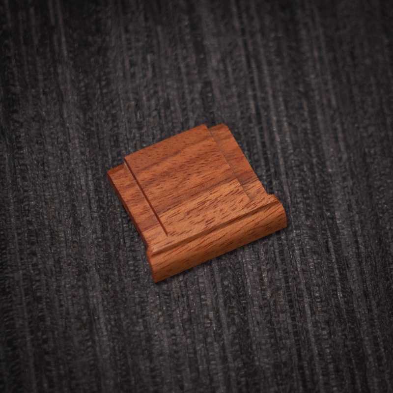 Ricoh GR4 Hotshoe Cover Wood iWoodStore Wooden square object on a textured dark surface