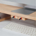 Wood Telescopic Retractable Data Cable Charging Cable For Desk iWoodStore Wooden desk with keyboard tray and keyboard on a light gray surface
